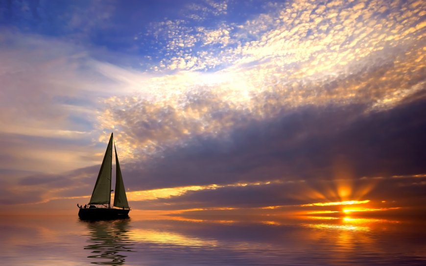 清晨的海平面 小帆船壁纸