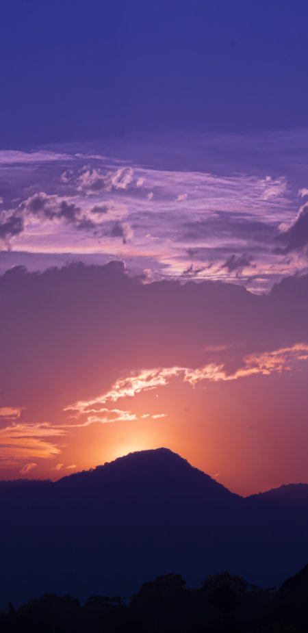 唯美山峰云彩夕阳风景