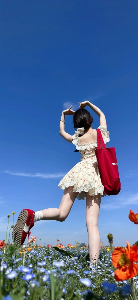 花海少女背影手机壁纸