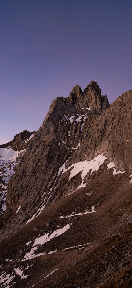 阿尔卑斯山峰日落雪岩地貌手机壁纸