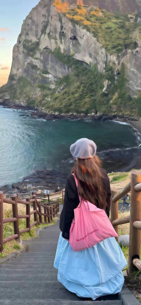 济州岛城山日出峰观海少女背影手机壁纸