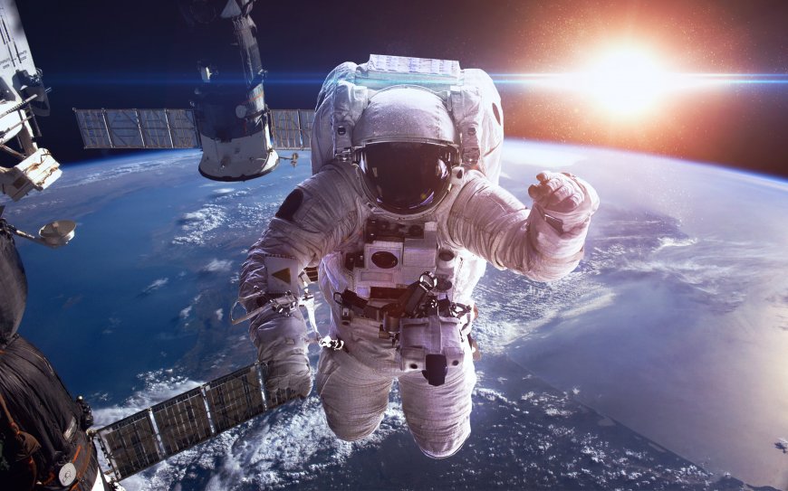 宇航员太空行走国际空间站地球日出壮丽背景风景电脑壁纸