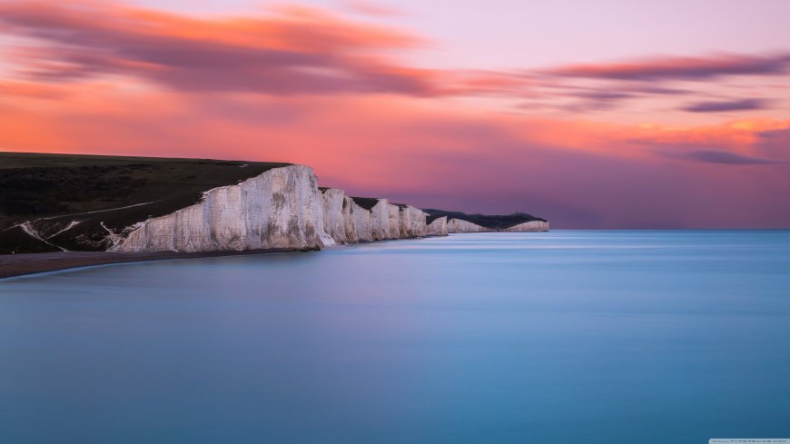 英国七姐妹白崖日落粉紫天空海景治愈电脑壁纸