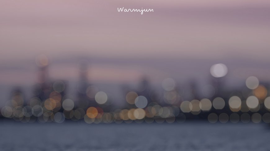 城市夜景光斑模糊紫色天空梦幻抽象创意电脑壁纸