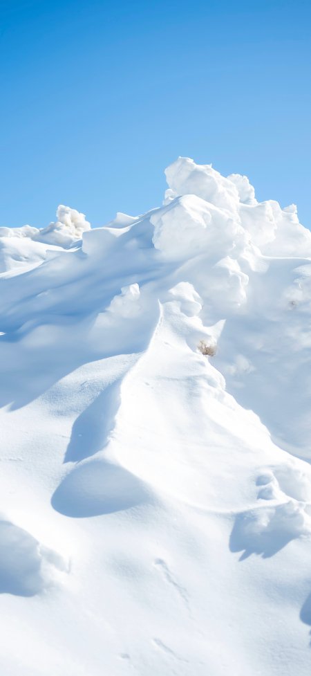 雪地阳光积雪堆叠纯净冬日风景手机壁纸