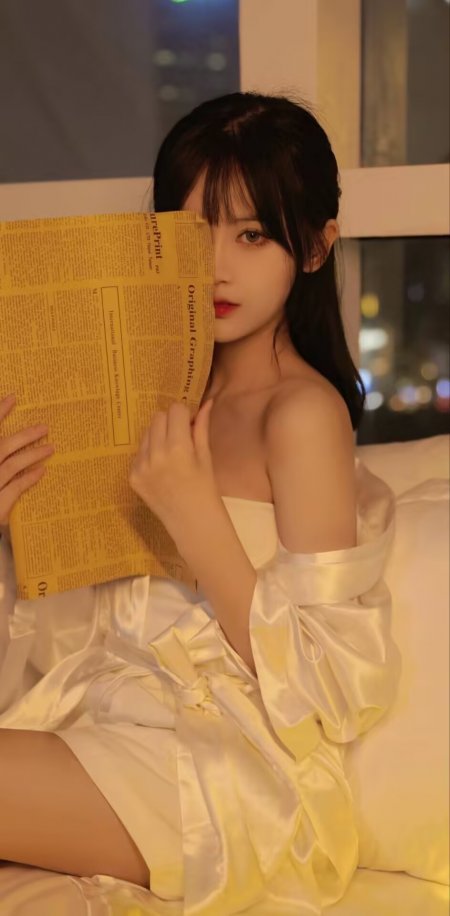 白丝质睡衣拿报纸美女床上写真手机壁纸