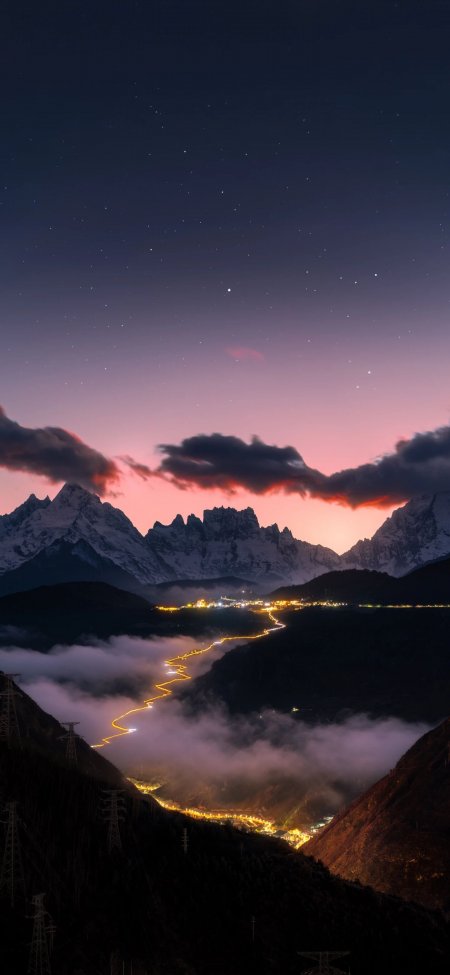 梅里雪山夜景星光与云海公路风景手机壁纸