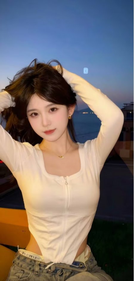 美女穿白拉链上衣牛仔裤海边撩发人物手机壁纸