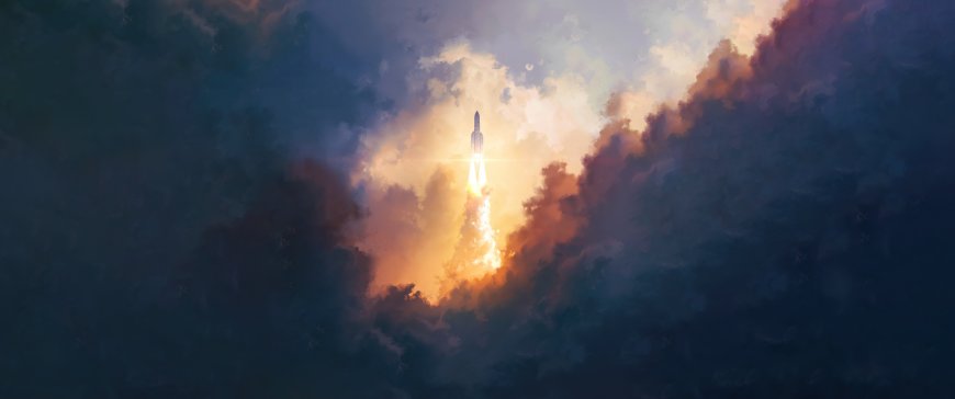 火箭冲破云层直冲天际尾焰明亮科幻风景电脑壁纸