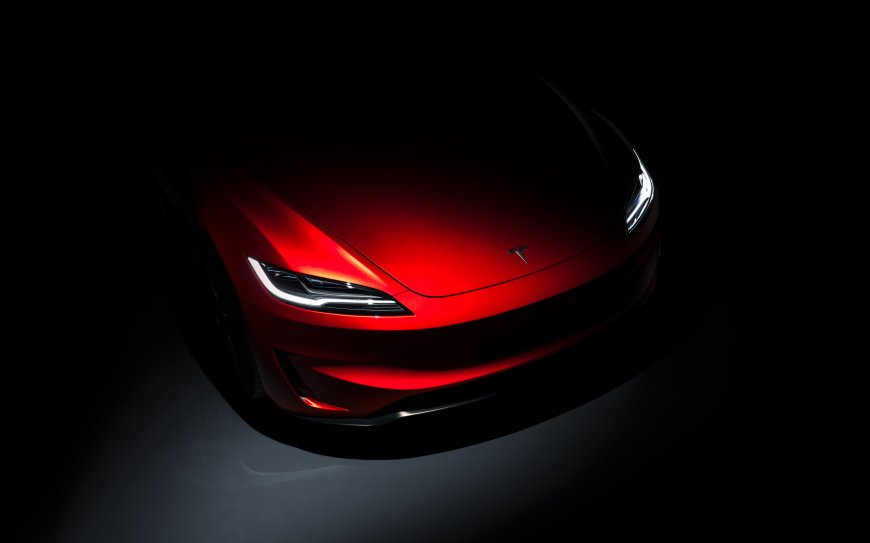 特斯拉Model3烈焰红车头特写暗黑背景科技汽车电脑壁纸