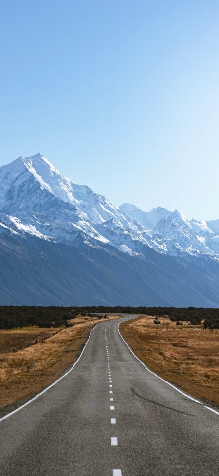 雪山公路延伸远方蓝天白云自然风光风景手机壁纸