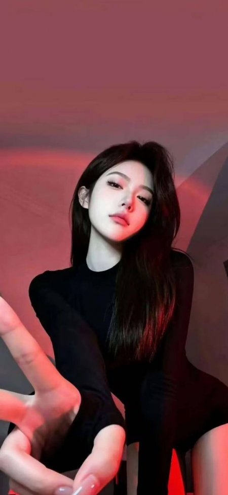 美女黑发黑衣红光氛围感特写人像摄影手机壁纸