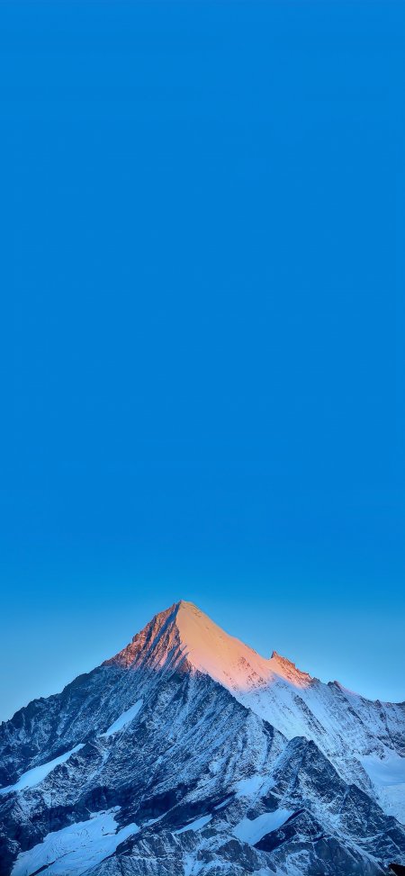 日照金山峰顶染金辉壮丽雪山风光风景手机壁纸
