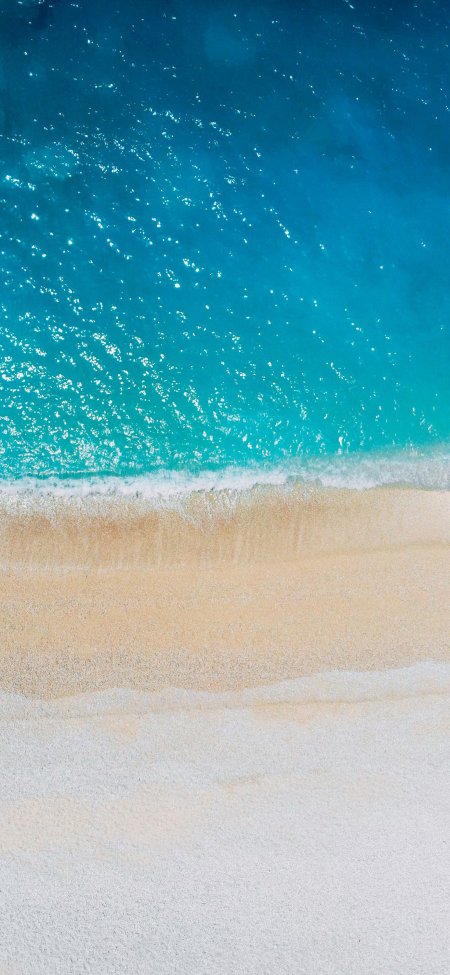 碧蓝海水轻抚洁白沙滩波光粼粼治愈系风景手机壁纸