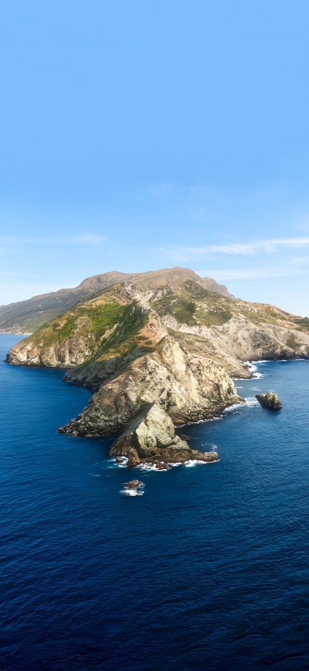 蔚蓝大海中陡峭岩石岛屿壮丽海岸风光风景手机壁纸