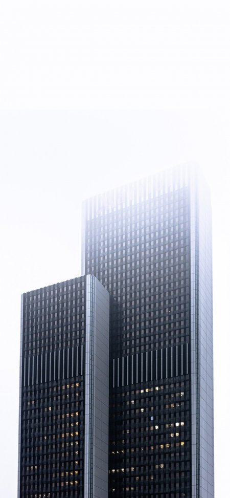 城市高楼雾气缭绕现代建筑几何线条极简风格风景手机壁纸