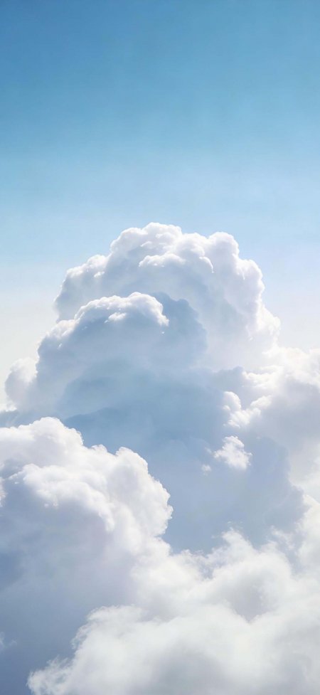 高空俯瞰蓬松积云浅蓝天空治愈风景手机壁纸