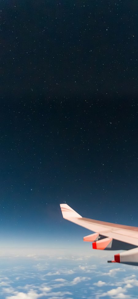 机舱窗外星空云海夜航机翼浪漫旅行风景手机壁纸