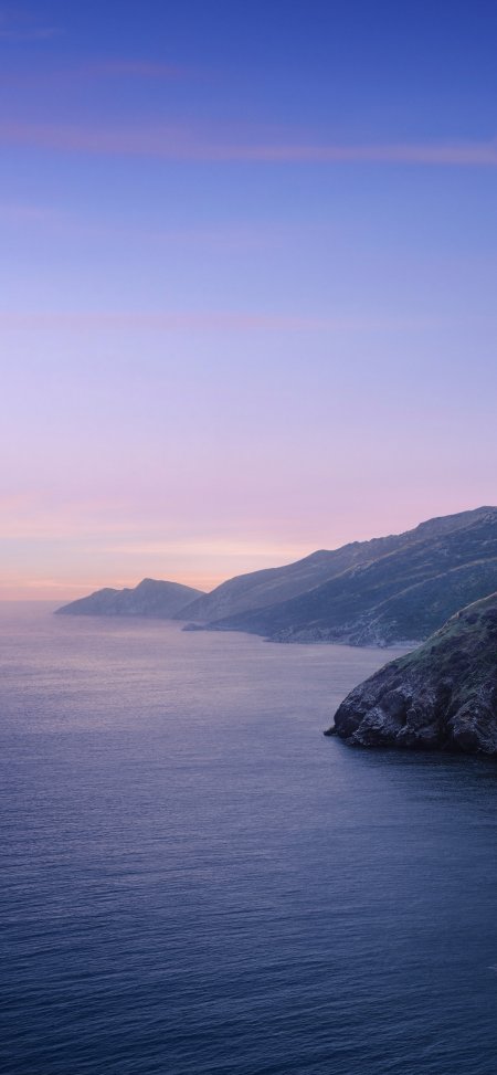 紫蓝晚霞悬崖海岸静谧大海治愈风景手机壁纸