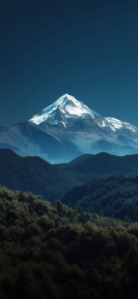白雪尖峰蓝天森林层峦风景手机壁纸