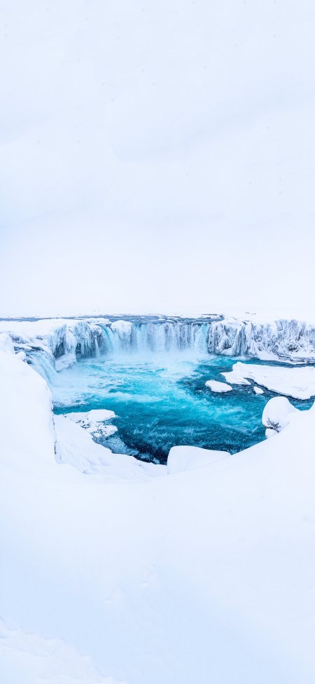 冰岛冬日瀑布雪景碧水风景手机壁纸