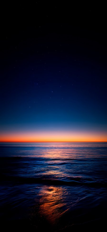 星空海面橙粉晚霞倒影静谧风景手机壁纸