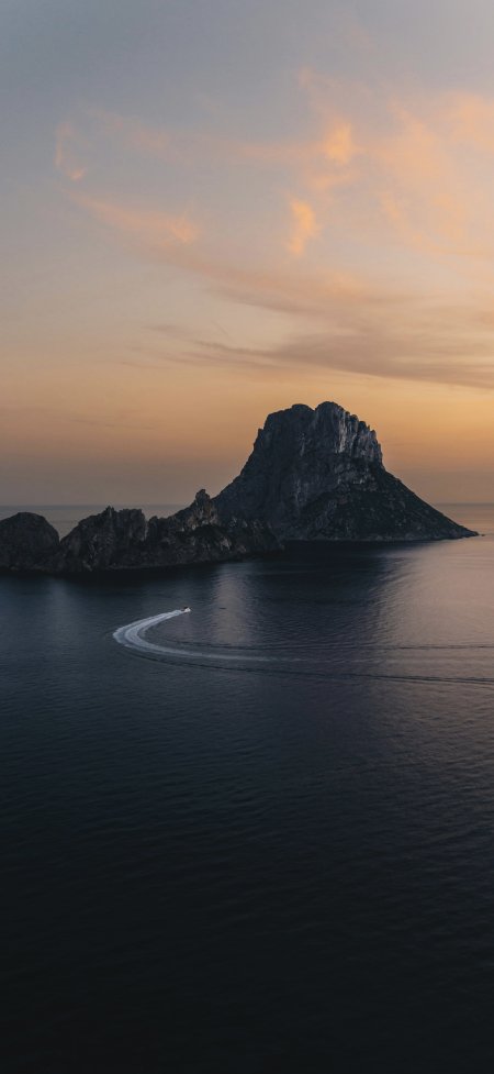 夕阳海岛小船航迹唯美风景手机壁纸