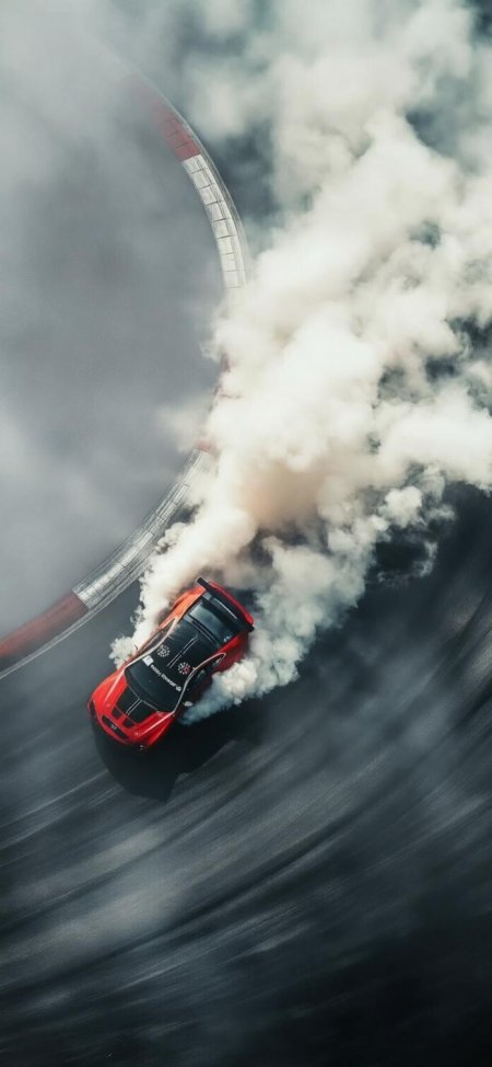 红色跑车赛道漂移白烟俯瞰酷炫汽车手机壁纸