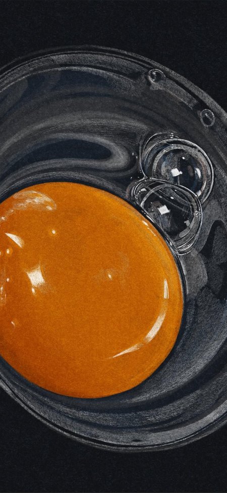 暗黑背景金黄蛋黄特写摄影手机壁纸