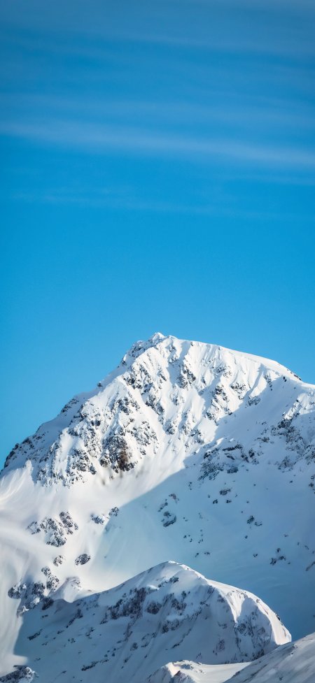 雪峰蓝天峭壁特写冷调风景手机壁纸