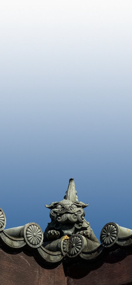 古建屋脊兽蓝天留白风景手机壁纸