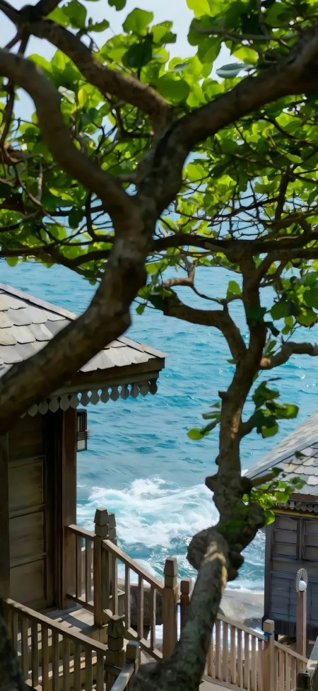 绿树掩映海边别墅碧波风景手机壁纸