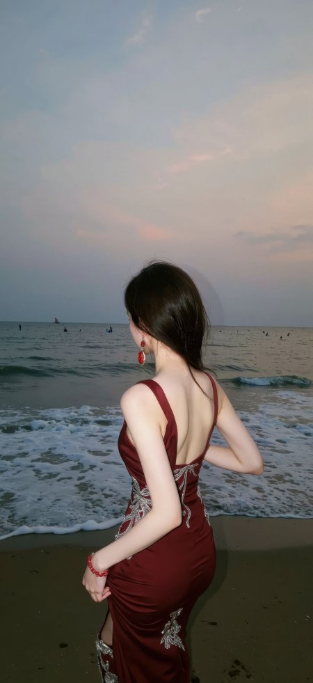 酒红露背长裙背影美女沙滩看海人物手机壁纸