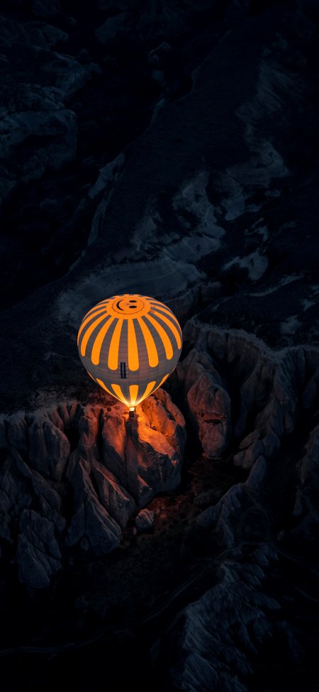 夜色峡谷俯瞰发光笑脸热气球奇幻风景手机壁纸