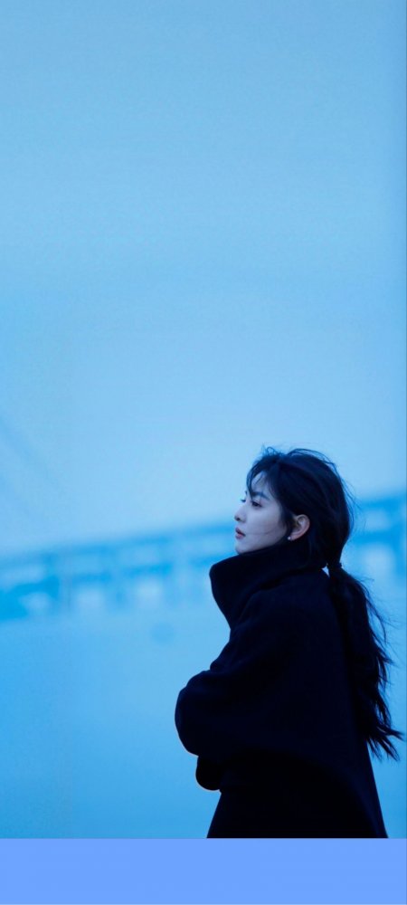 冷蓝侧颜冬装氛围感美女手机壁纸