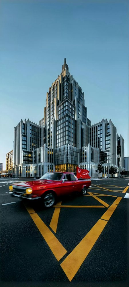 暮色红车高楼路口街景汽车手机壁纸