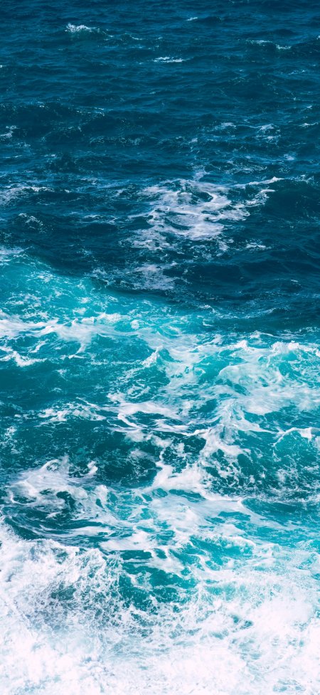 俯拍深蓝海面涌浪花风景手机壁纸