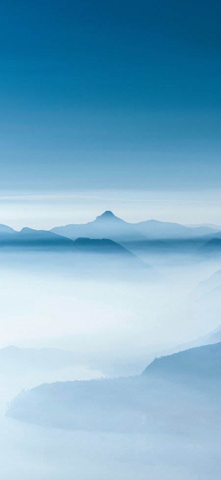 蓝调云海尖峰极简意境风景手机壁纸