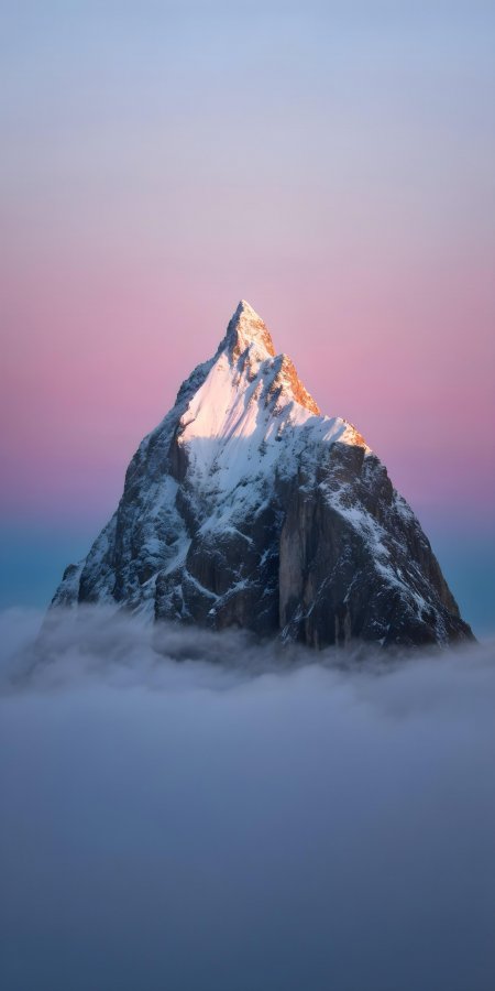 雪山峰顶破云而出粉紫渐变风景手机壁纸