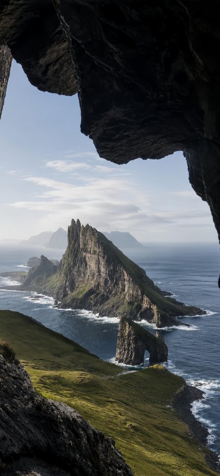 法罗群岛海蚀拱门翠绿海岸蓝灰风景手机壁纸