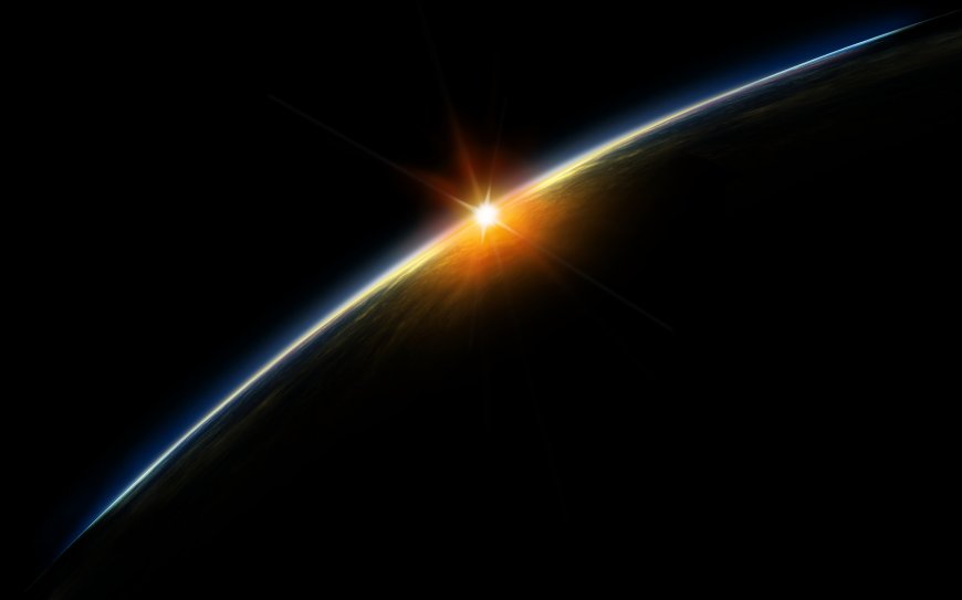 地球曲率日出光辉暗蓝太空科幻电脑壁纸