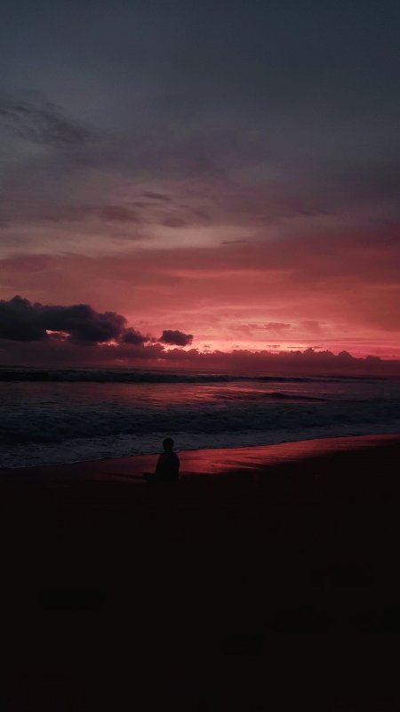 海边剪影夕阳余晖暗红风景手机壁纸