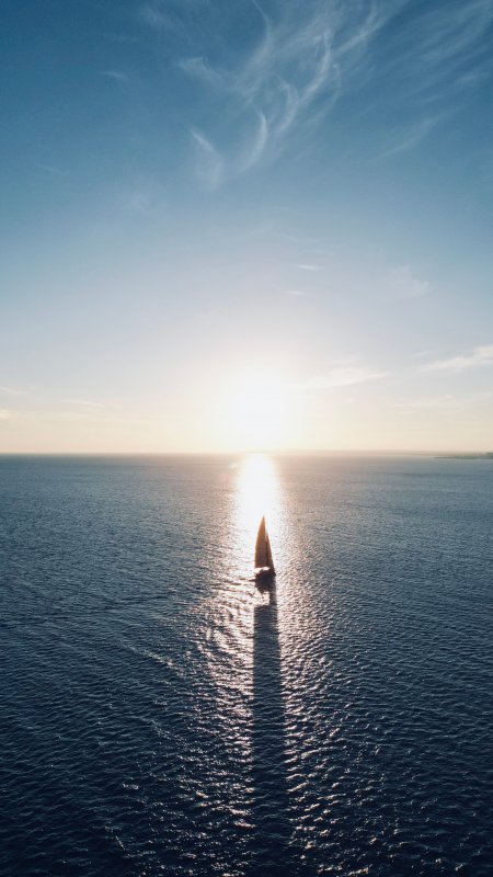 帆船夕阳海面金蓝风景手机壁纸精选