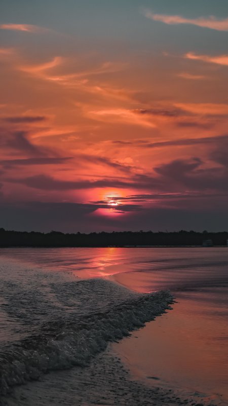 夕阳海面波光粼粼橙红风景手机壁纸
