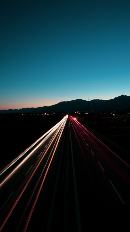 高速公路车流光轨蓝紫渐变风景手机壁纸