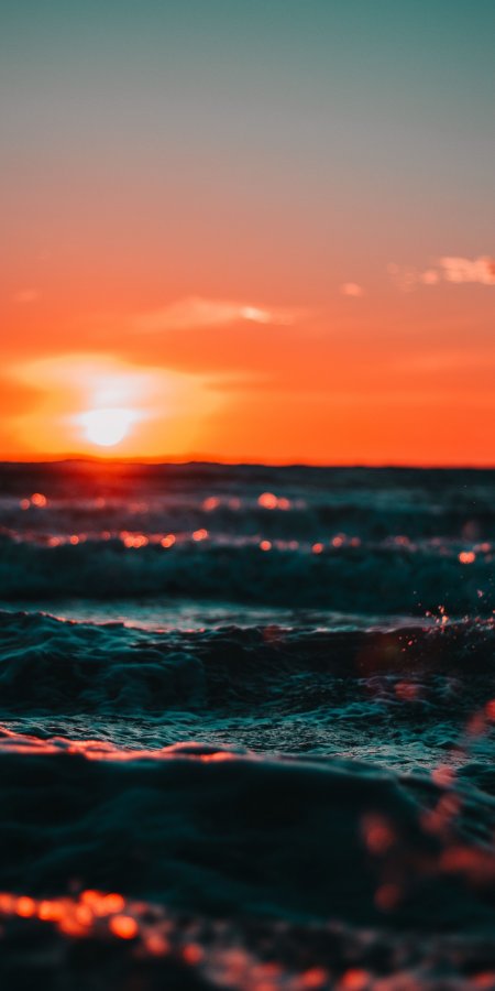 海面日落余晖橙红蓝调风景手机壁纸