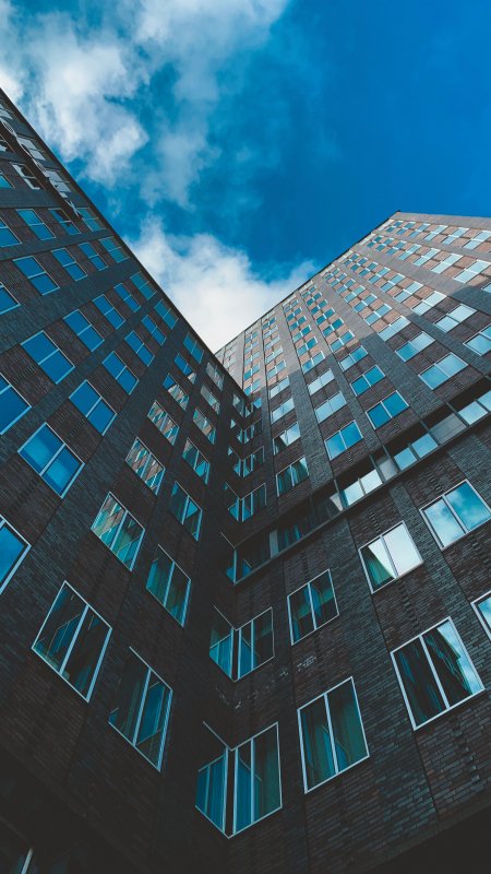 现代建筑仰拍蓝天白云蓝灰城市建筑手机壁纸