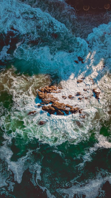 海浪拍礁石蓝绿白自然风景手机壁纸