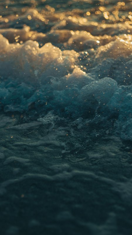 海浪泡沫金色光斑蓝绿风景手机壁纸