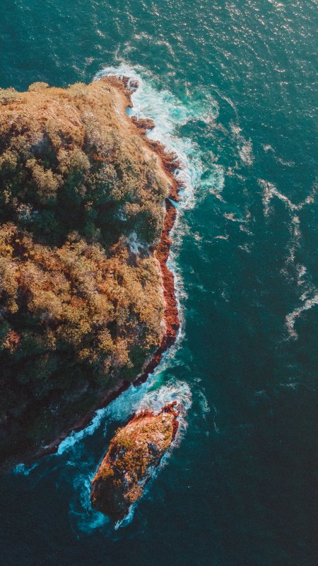 海岸悬崖海浪拍岸蓝绿风景手机壁纸